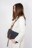 Zoe waterproof and leather satchel